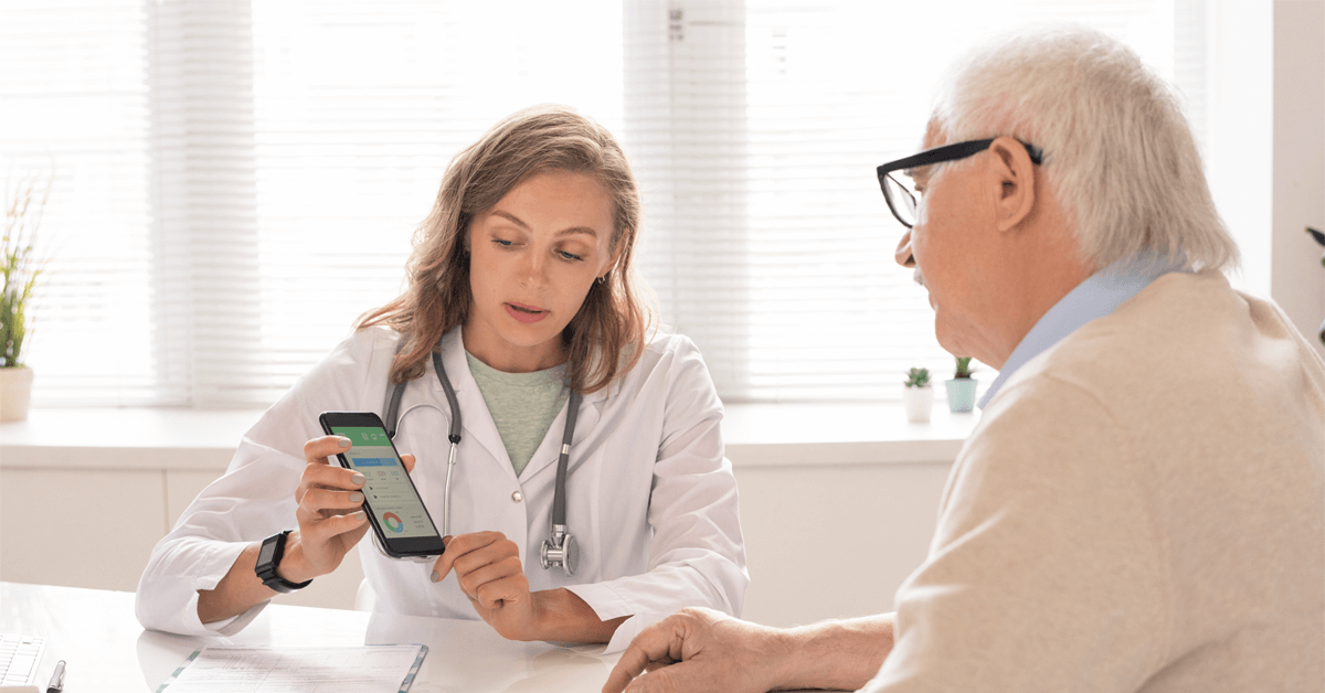 doctor explaining healthcare data to a patient